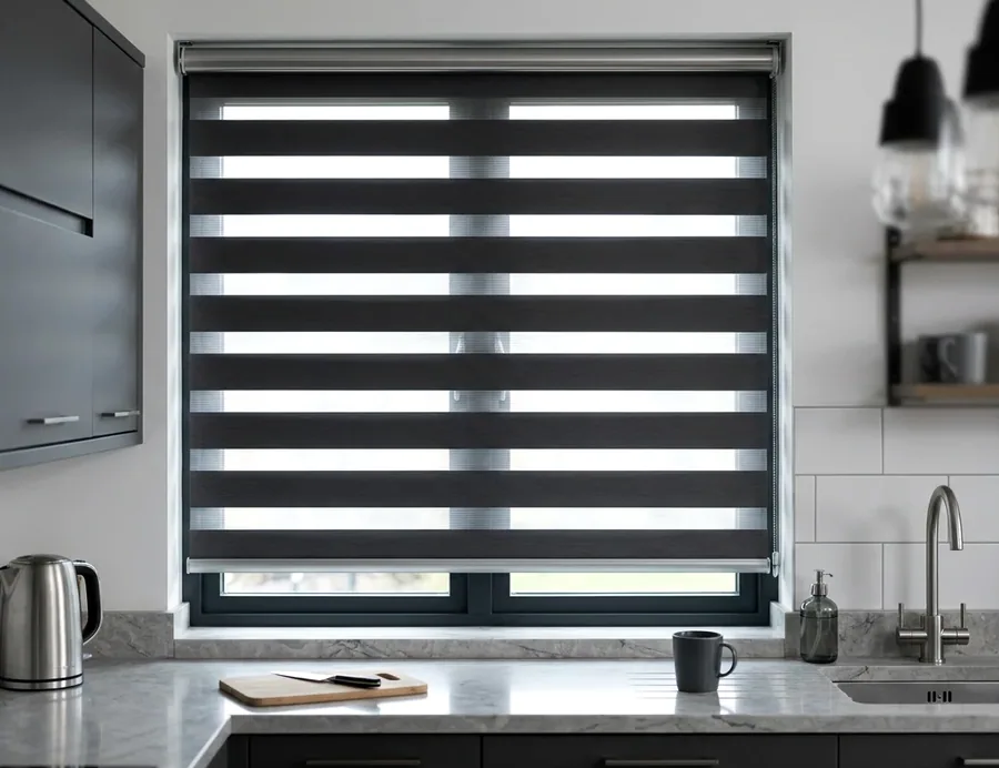 Day and night blind with alternating sheer and solid bands across a kitchen window